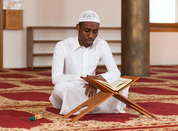Man Reading Holy Islamic Book Koran